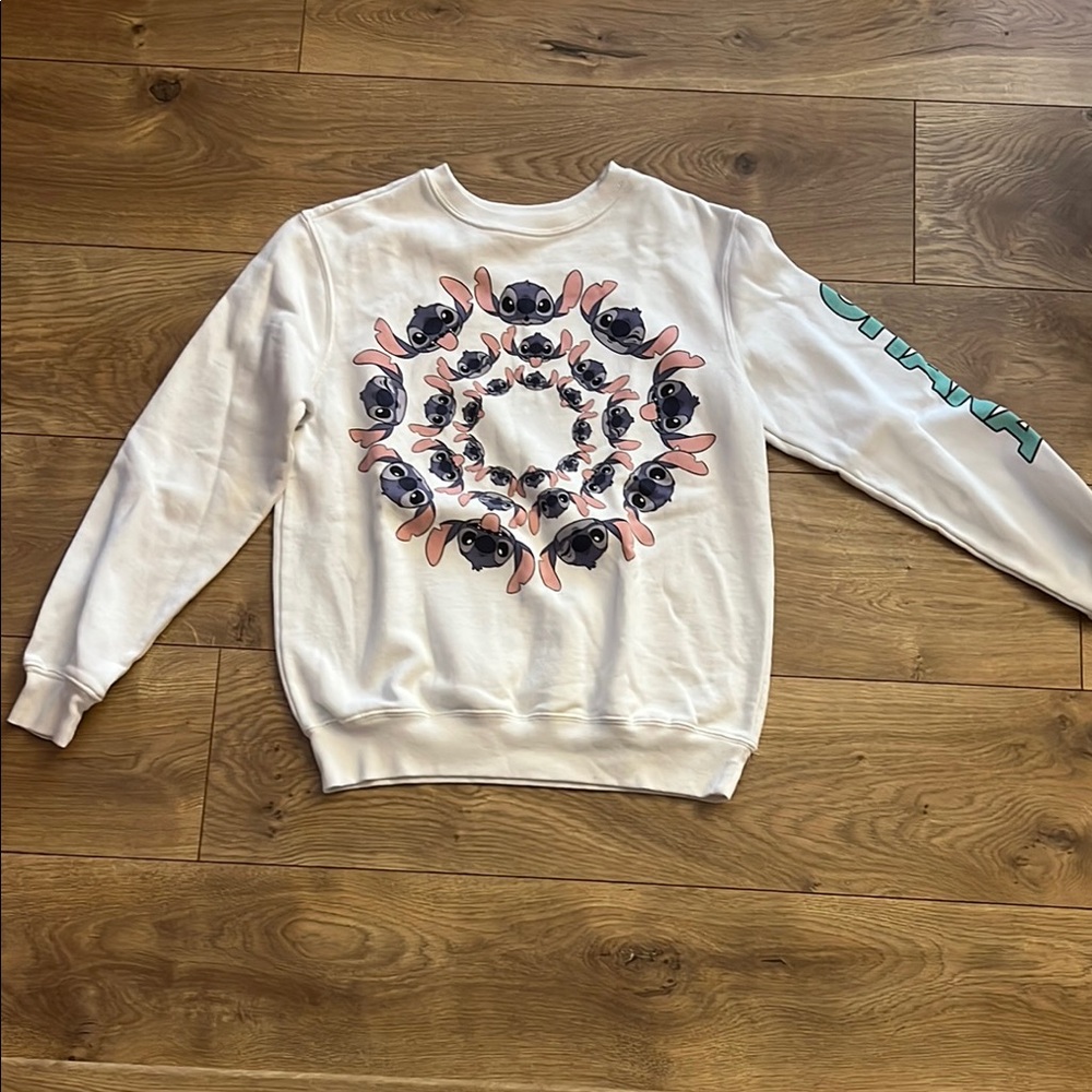 Disney’s Stitch White Sweatshirt with Ohana on one sleeve